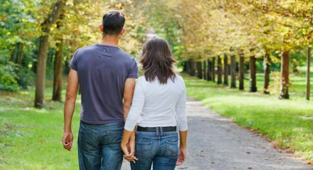 Married Couple Walking Hand in Hand