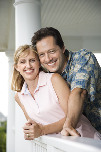 Married Couple Hugging on the Porch